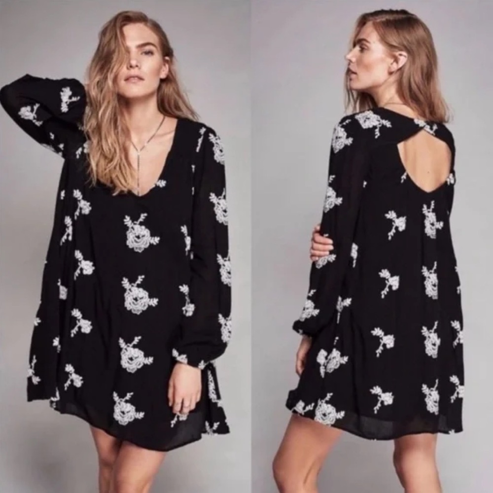 Free people black dress with white embroidered flowers size small